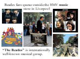 Beatles fans queue outside the HMV music store in Liverpool. “The Beatles” is internationally well-known musical group.