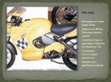 ИЖ- 6.675. Мотоцикл в стиле спорт-байк. Двигатель ВП-50. Передняя вилка, задние амортизаторы и дисковые тормоза от Планеты. На мотоцикле отсутствуют указатели поворотов и приборная панель.