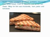 Panini - Italian sandwich or closed sandwich. It is made from white bread, most of baguette and served hot. Classic filling for him was mozzarella, ham, pesto and tomatoes.