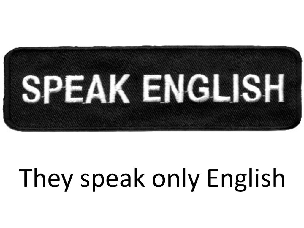 They speak ow. English only. We only speak English. Табличка English only.